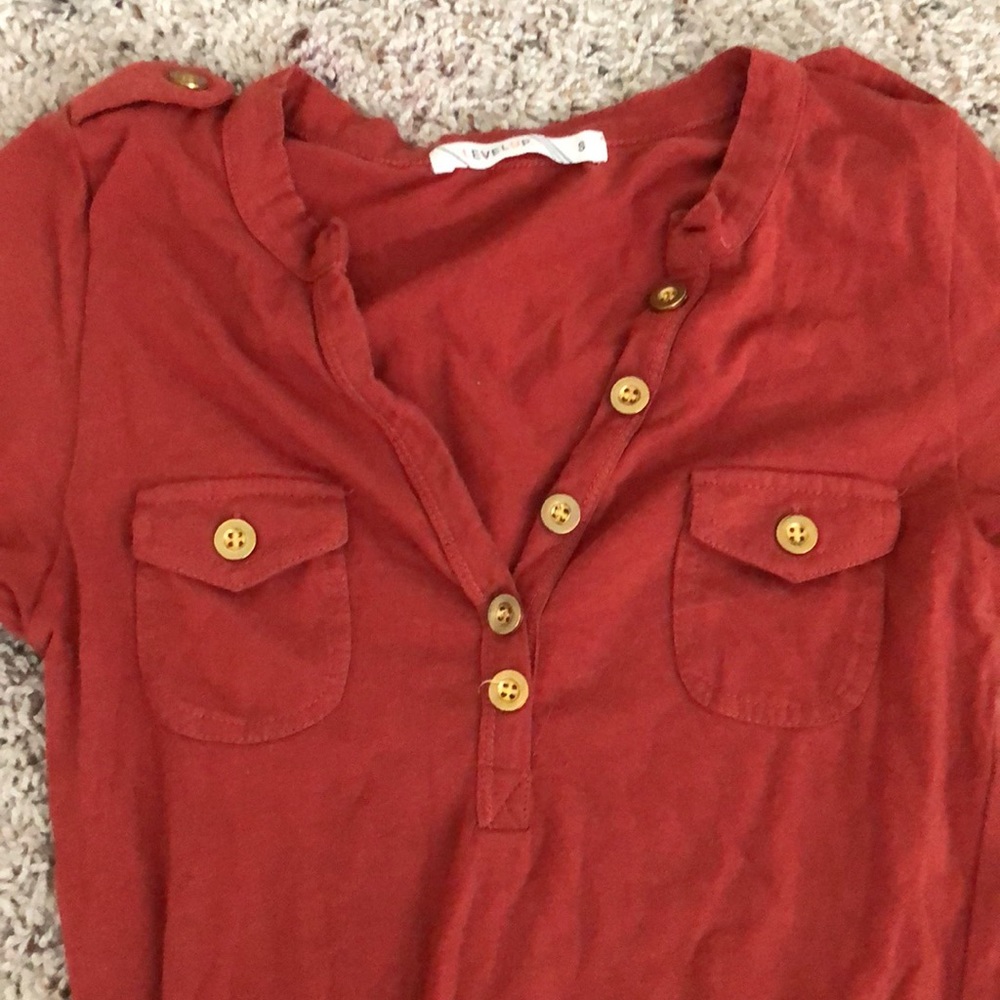 Orange button up top